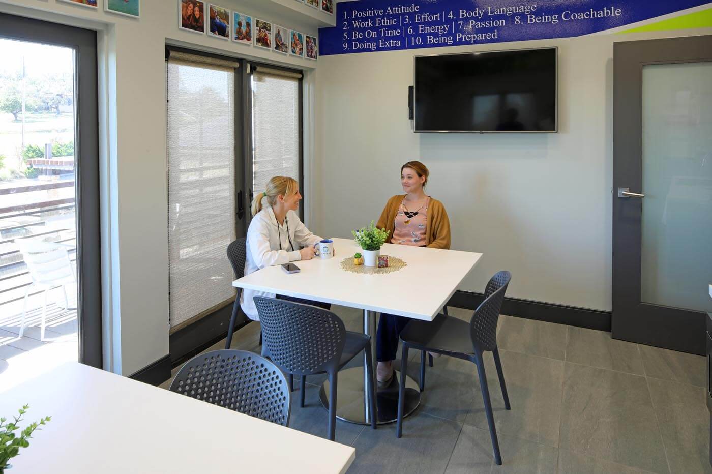 Dr. Cook meets with a patient in the SkyRidge office.